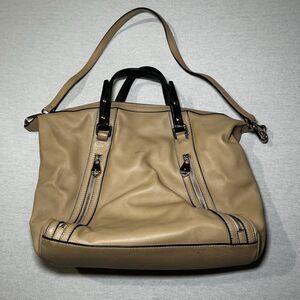 Pour La Victoire beige leather satchel bag with black top handles